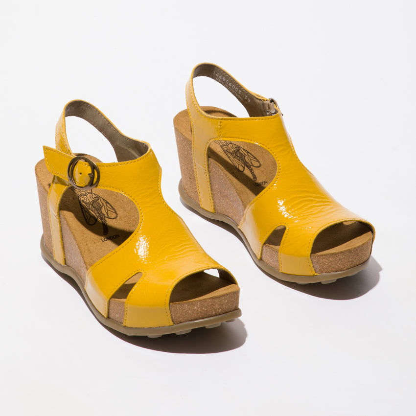 Fly London Goda856fly Luxor Yellow Patent Wedge sandal. Only size 8 left