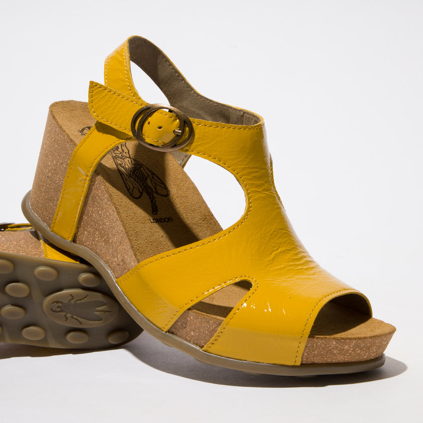 Fly London Goda856fly Luxor Yellow Patent Wedge sandal. Only size 8 left