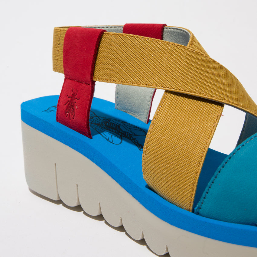 Fly London YAB1922 Cupido Red/Yellow/Azure Wedge sandal. Only size 8 left