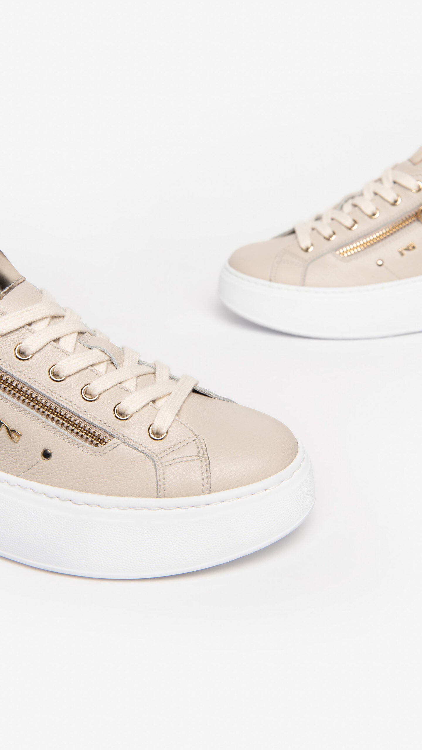 NeroGiardini Dollarino Beige and Gold Leather Wedge Trainer with side zip.